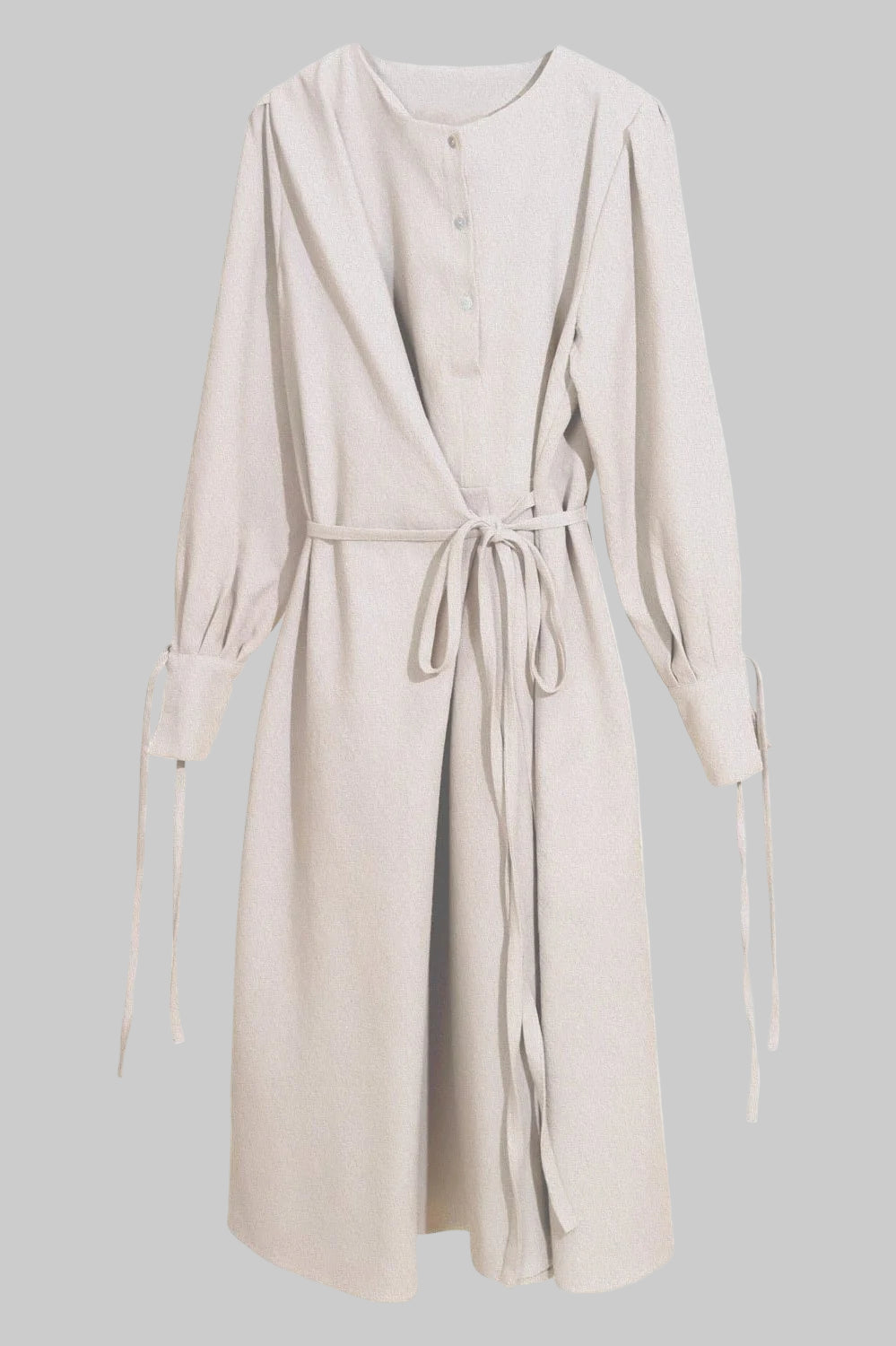 Beige robe with long sleeves and a belt on a white background