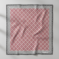 Red and white geometric patterned product with black border on a white background