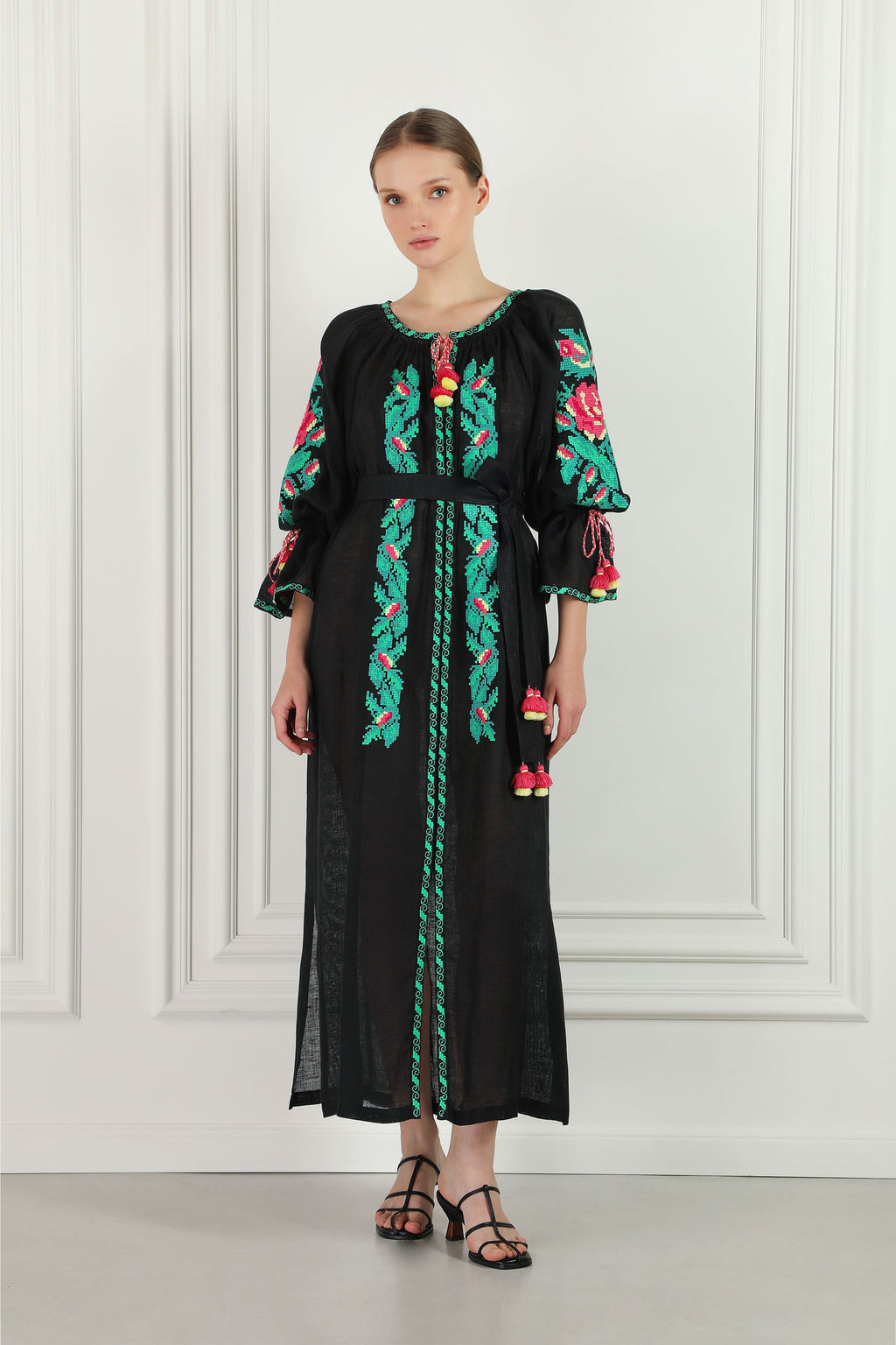 Model wearing the oversized floral hand-embroidered linen beach tunic
