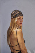 Black crochet beanie with gold metallic accents, Katerini Mou