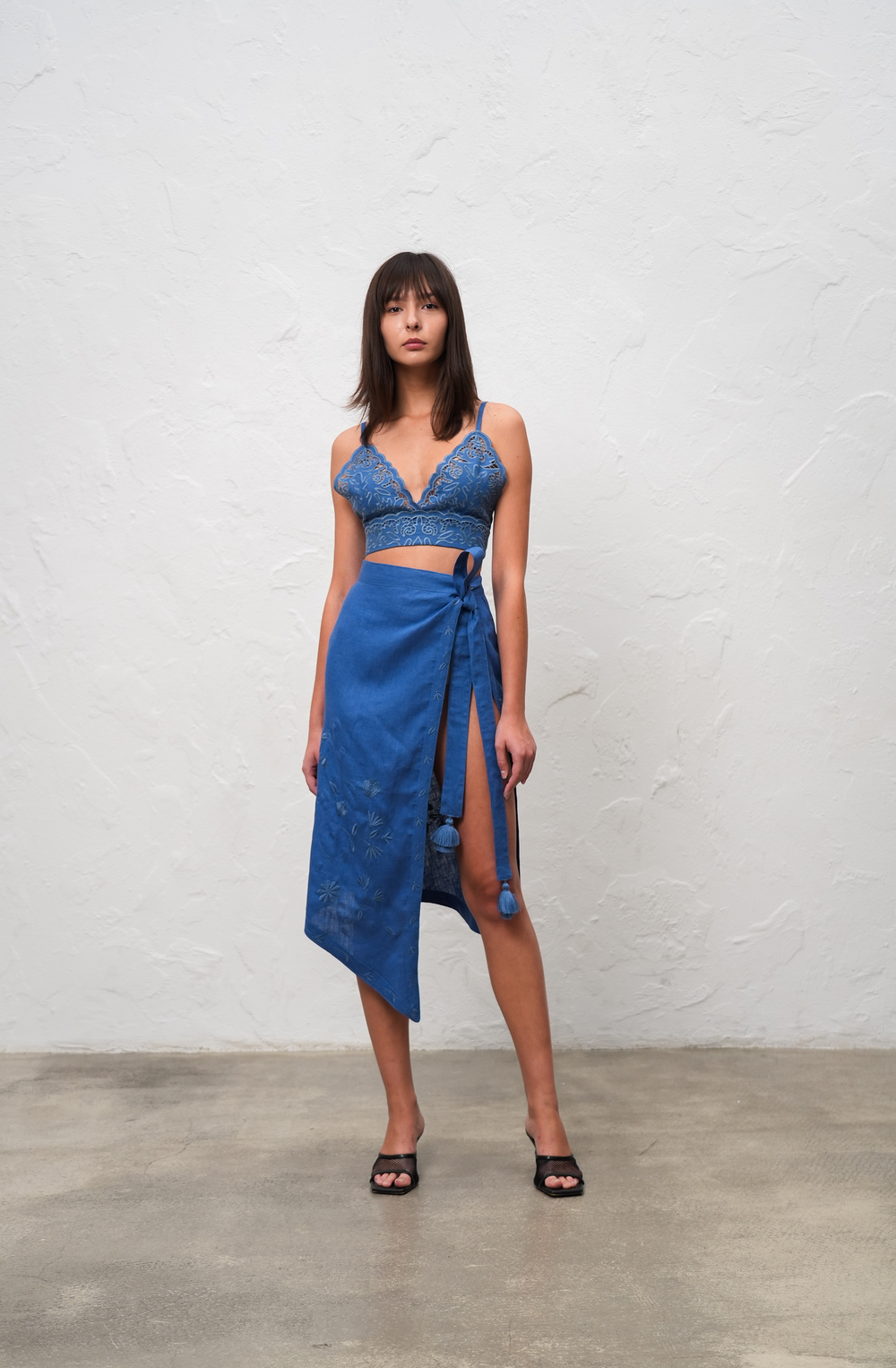 Hand-embroidered folk linen skirt with Richelieu cutwork – back view