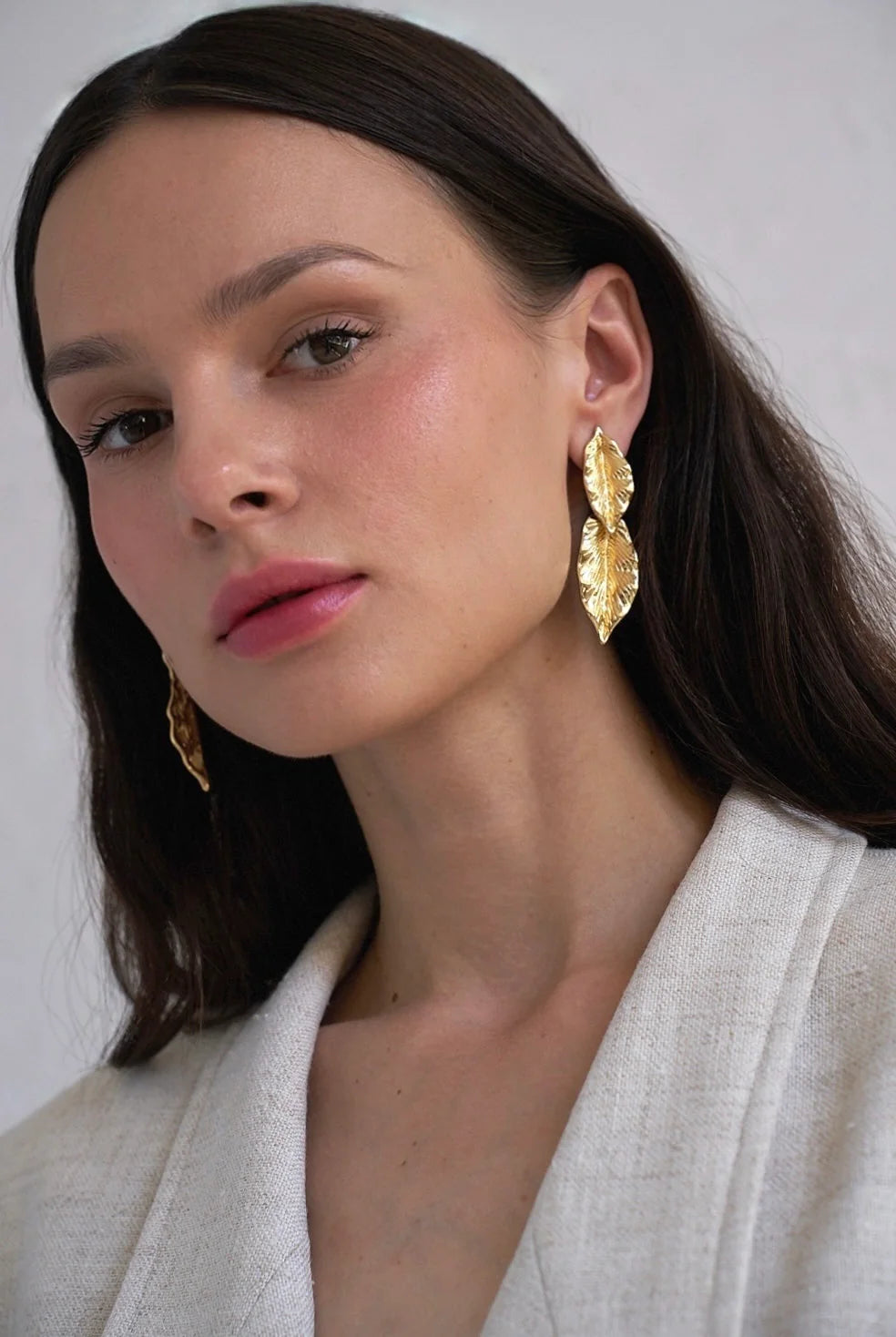 Gold leaf-shaped earrings, Greek-inspired, detail
