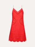 Red dress with lace details on a white background