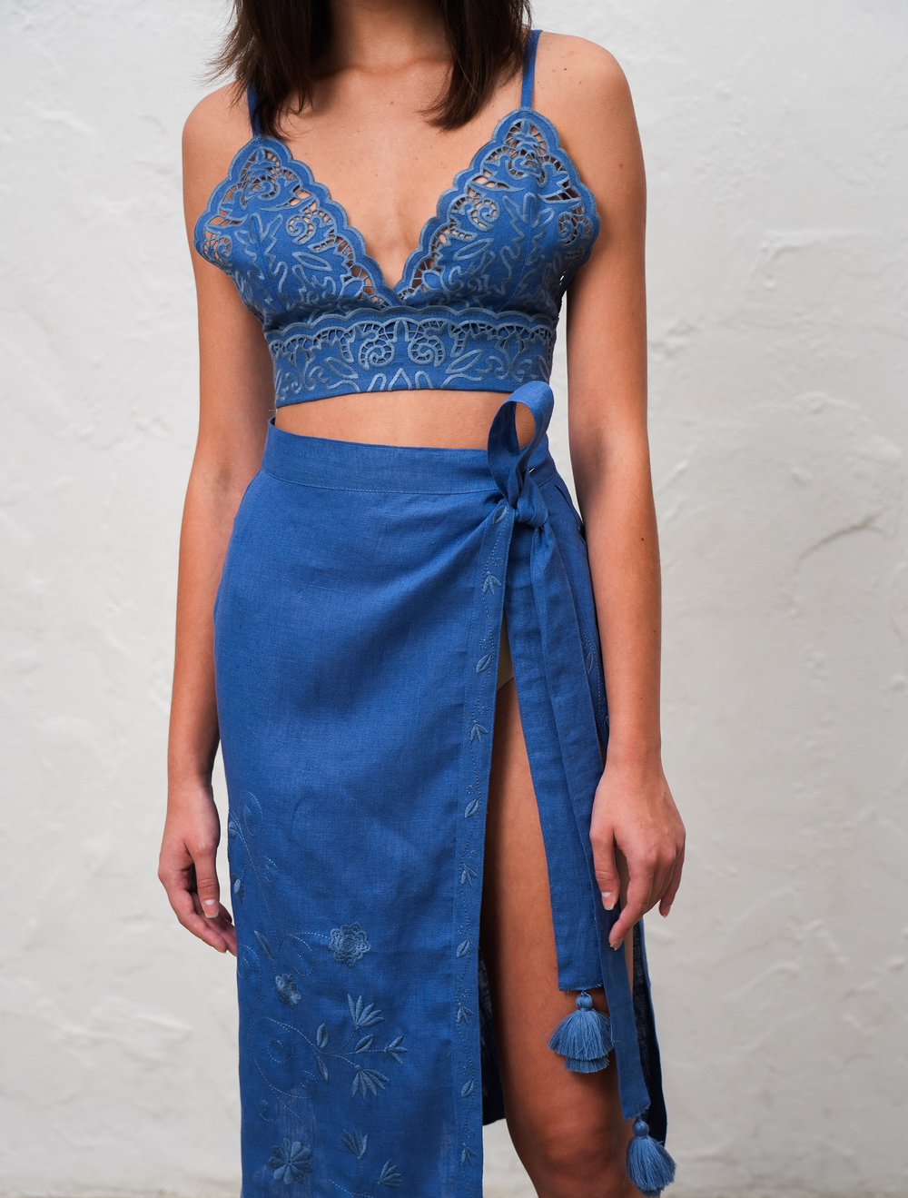 Hand-embroidered folk linen skirt with Richelieu cutwork – styled look