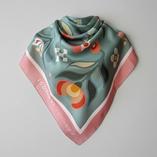 Decorative scarf with colorful patterns on a white background