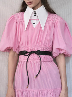 Black eco-leather waist belt that ties with a bow