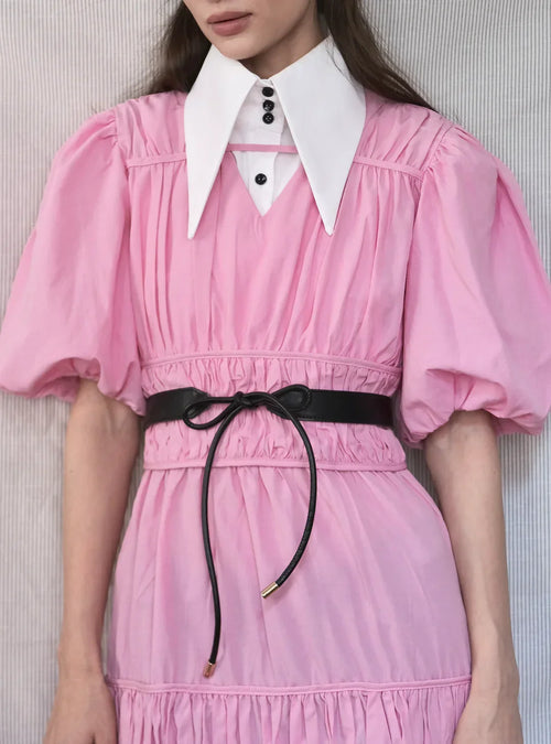 Black eco-leather waist belt that ties with a bow