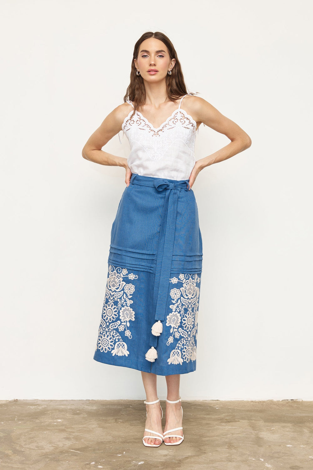 Hand-embroidered folk linen skirt with Richelieu cutwork – back view