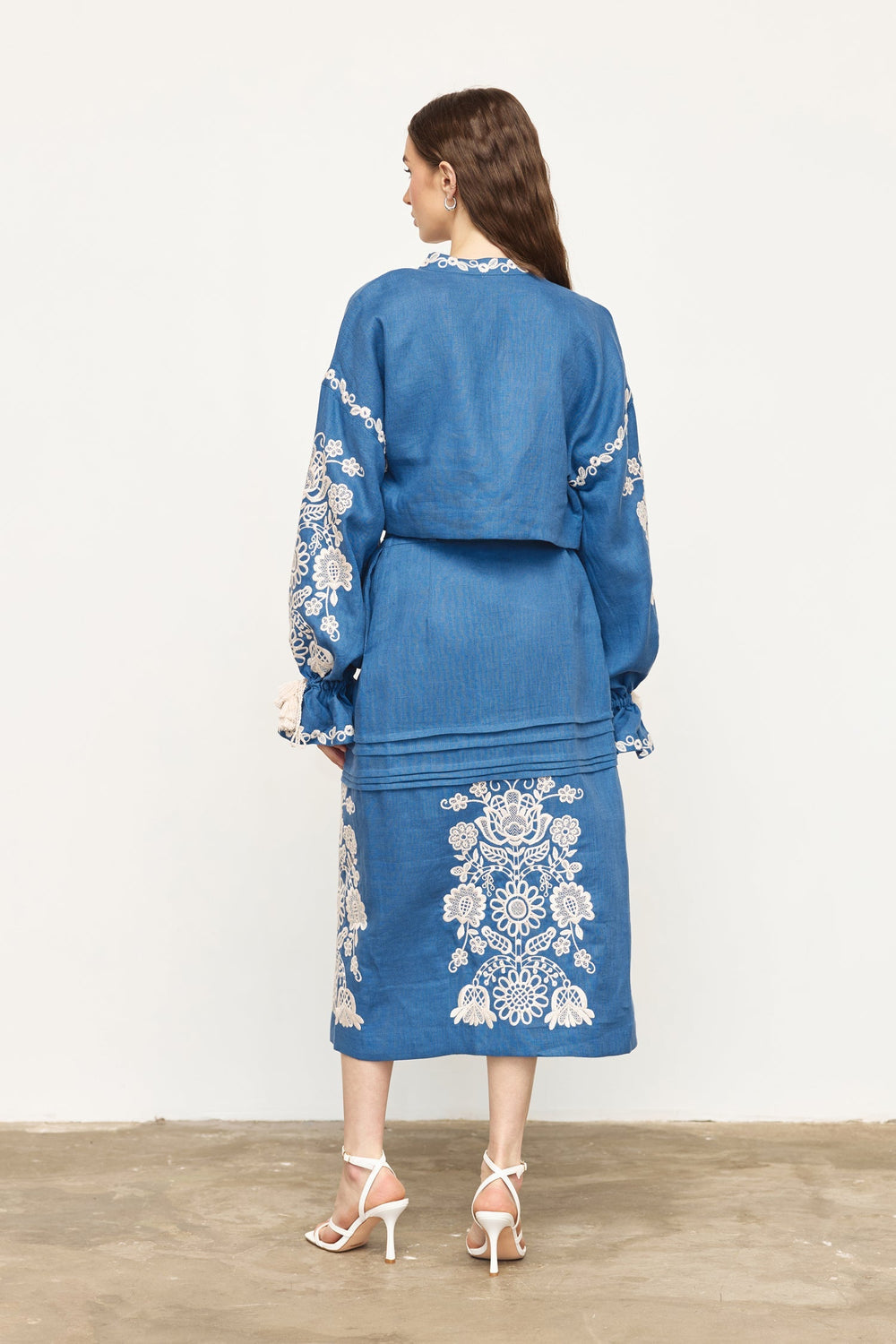 Hand-embroidered folk linen skirt with Richelieu cutwork – openwork detail