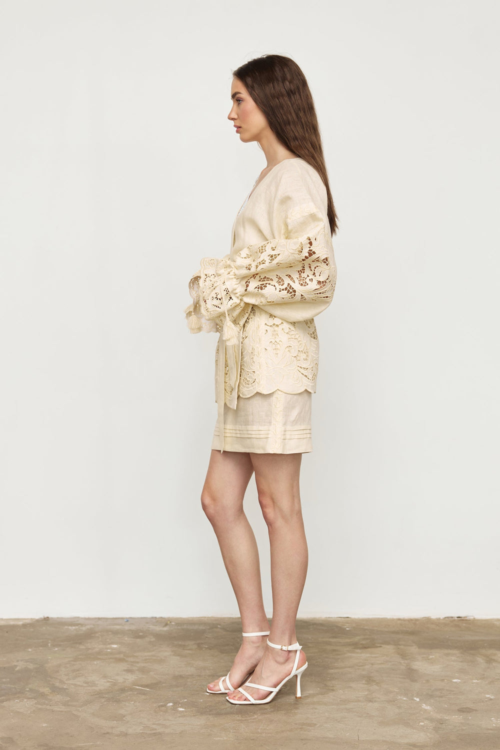Hand-embroidered folk linen skirt with Richelieu cutwork in ivory – fabric detail