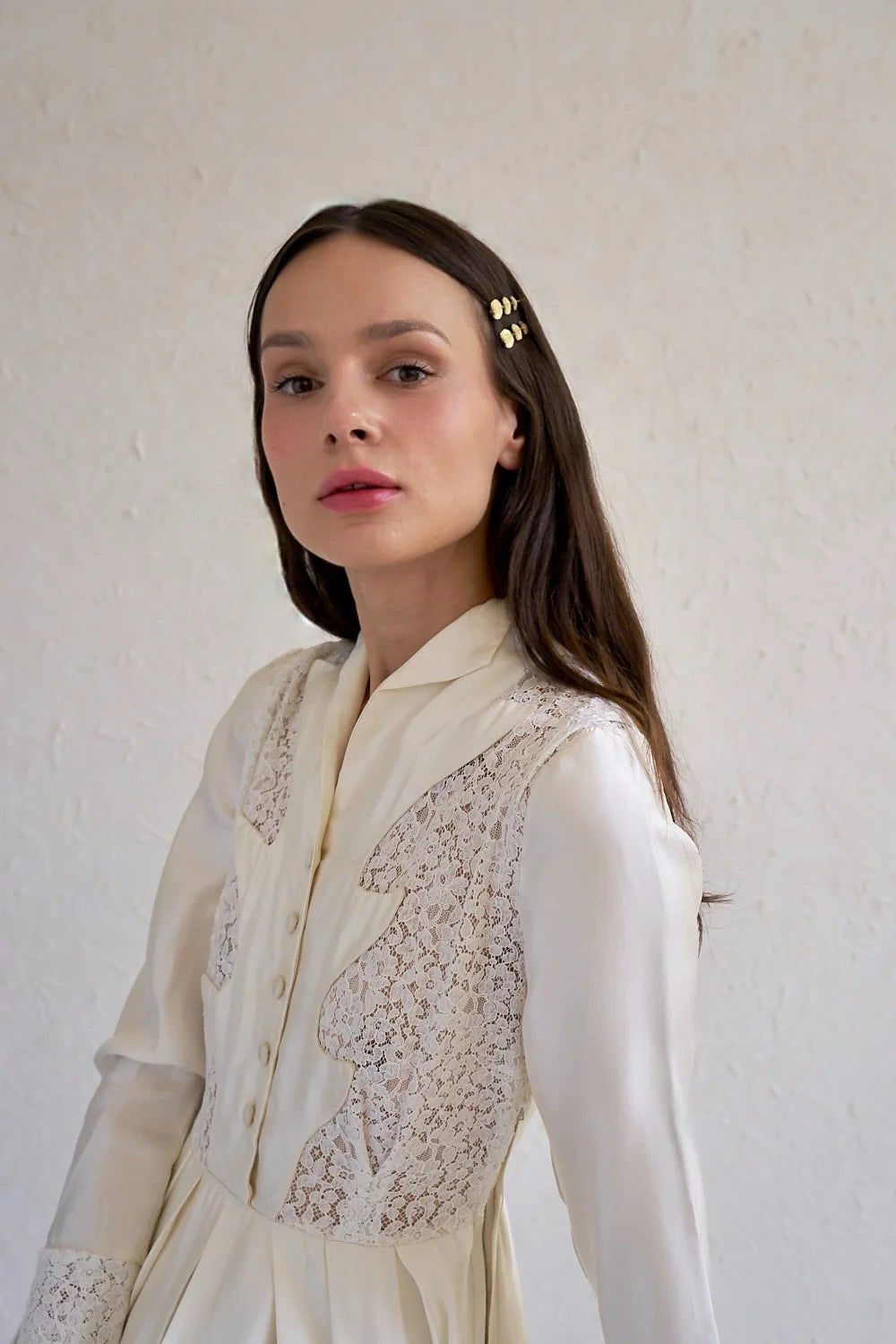 Athena golden leaf hair clip by Katerini Mou, styled in the hair