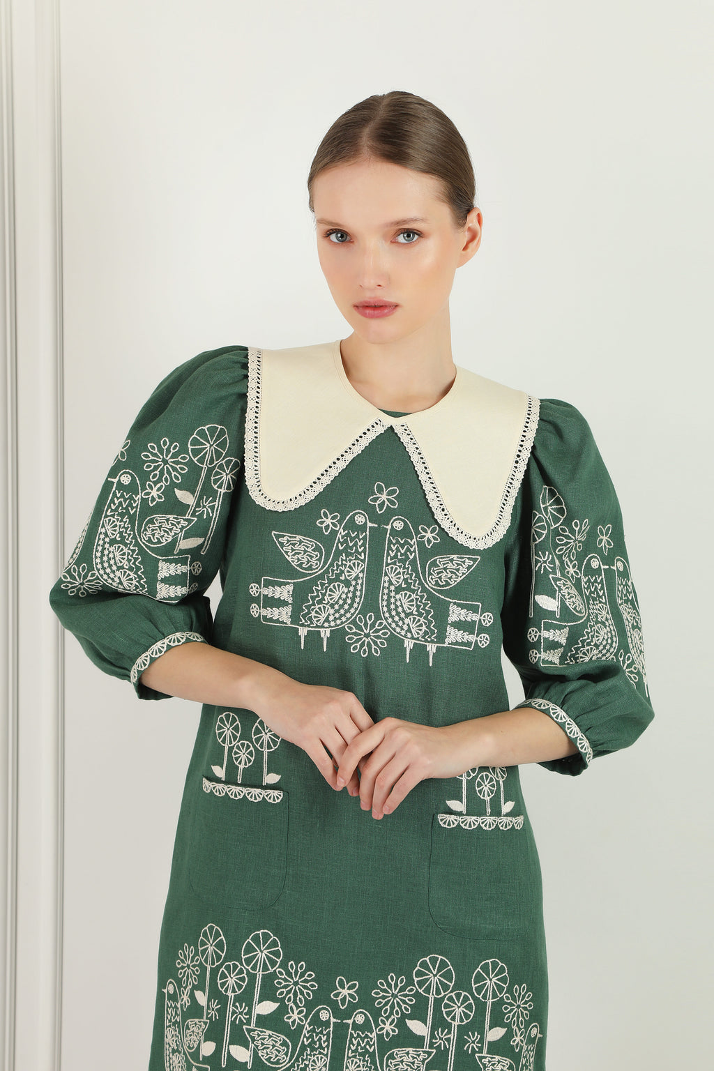 Zozulya green linen mini dress - buttoned cuff on 3/4 volume sleeve