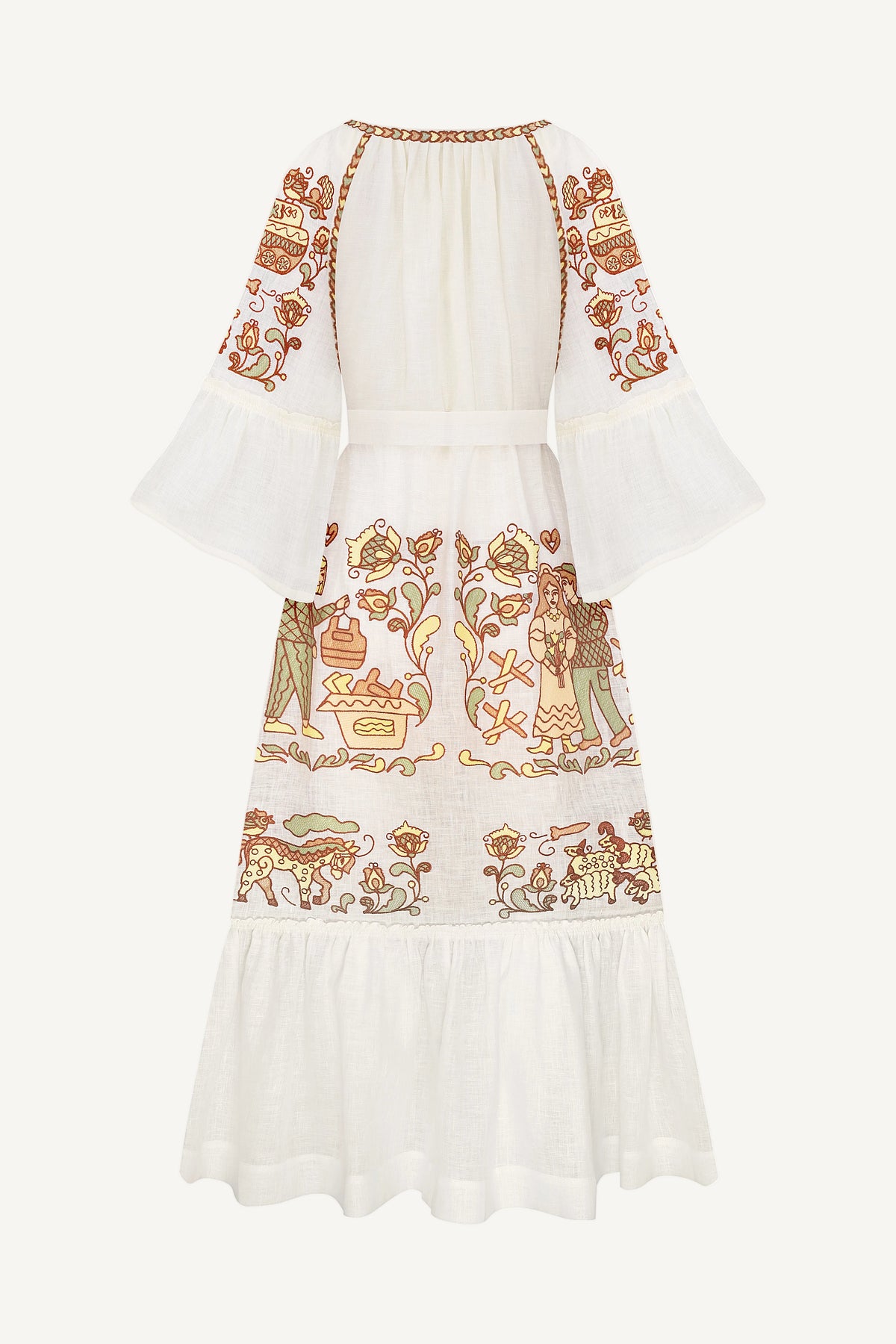 White dress with intricate orange and green embroidery on a white background
