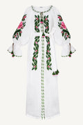White dress with floral embroidery on a white background