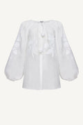 White blouse with balloon sleeves on a white background