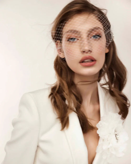 Mesh bridal veil with minimalist crystal brooches, detail
