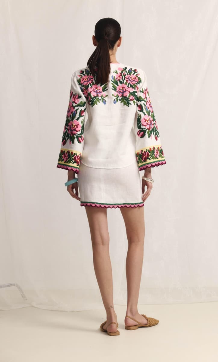 Model wearing the Bukovina embroidered white linen blouse