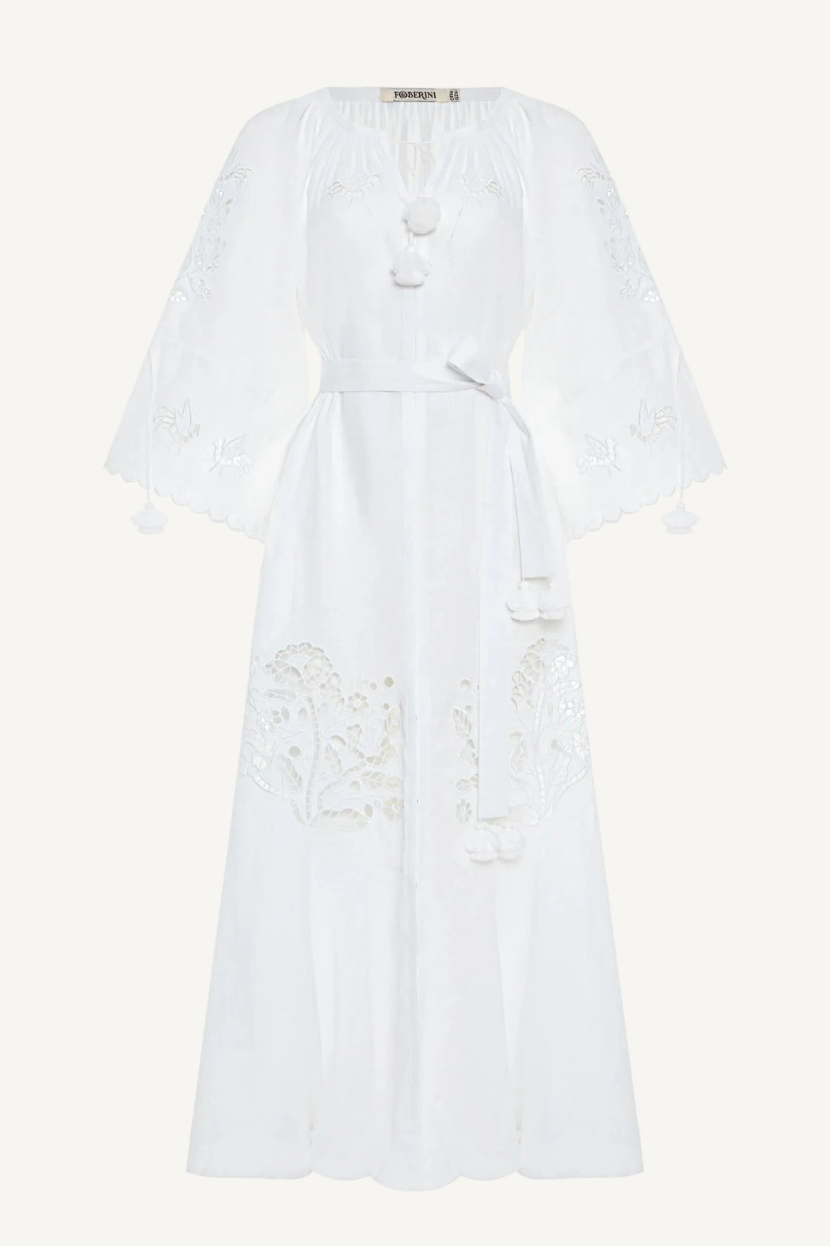 White dress with lace details on a white background