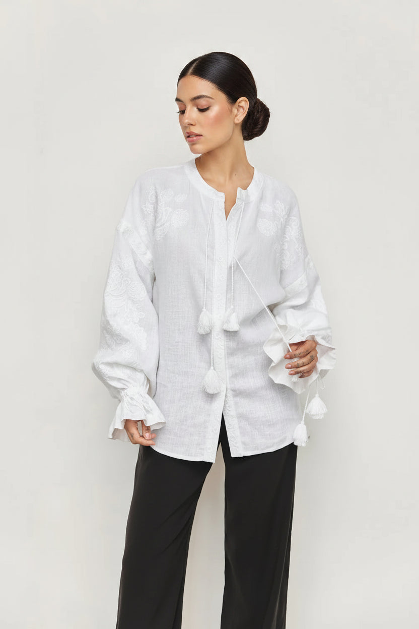 Designer woman long-sleeve linen blouse with embroidered details, tassel ties, and ruffled cuffs. Blouse Roumaine Shop