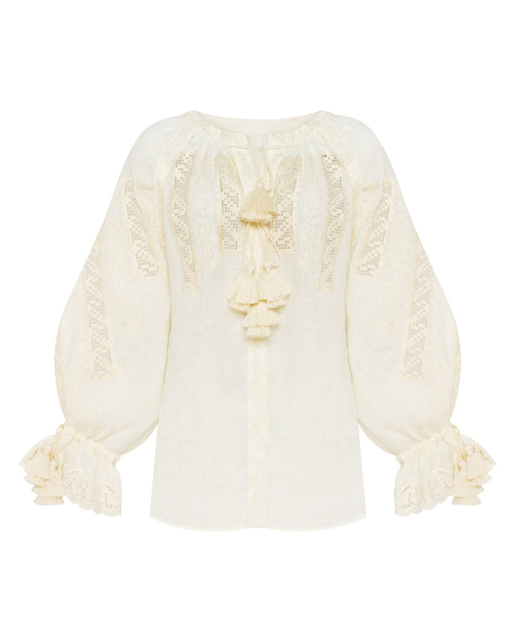 Hand-embroidered linen blouse in ivory – styled look.Desert Rose handcrafted natural linen blouse with front embroidery and tassel ties by ANNABO.