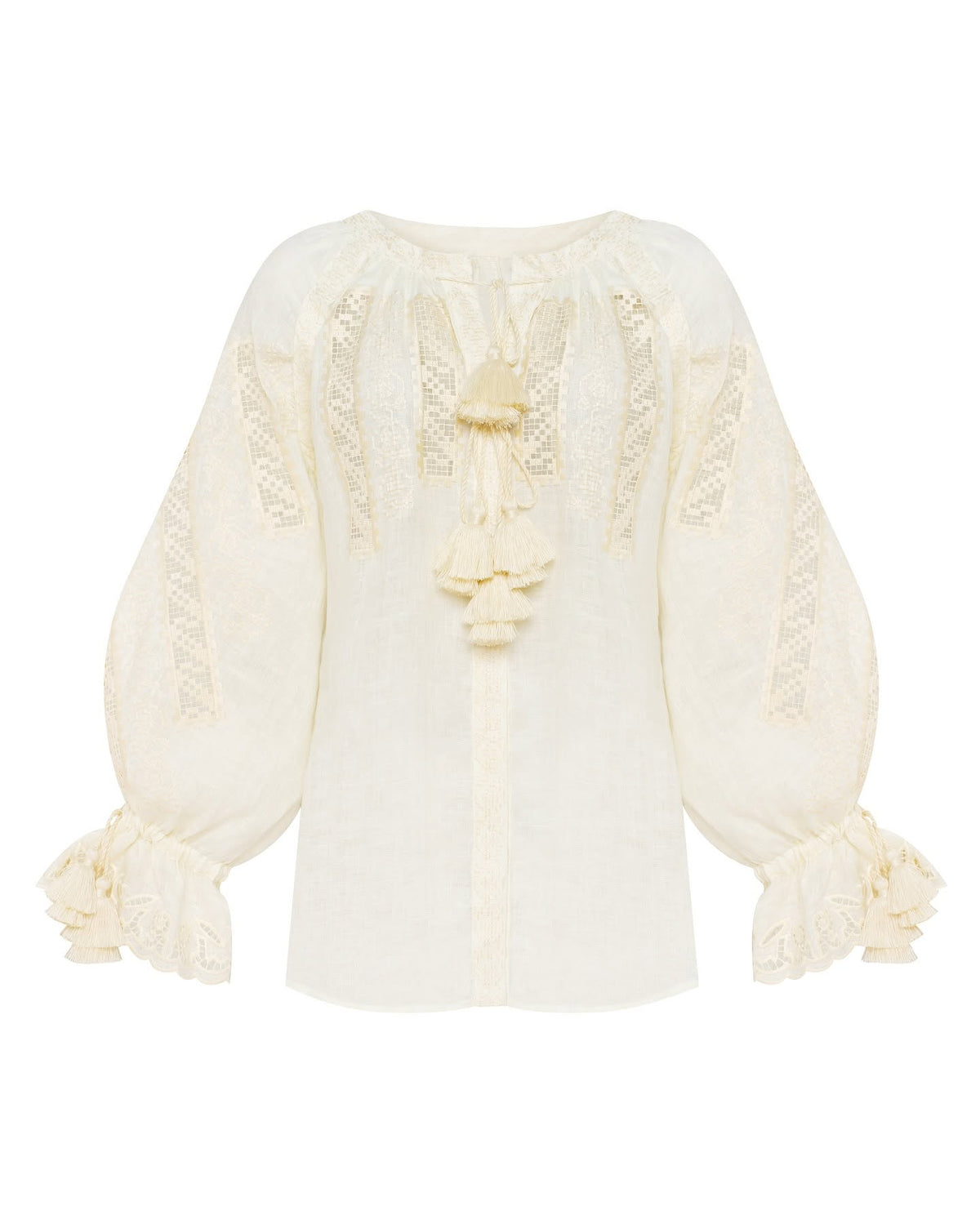 Hand-embroidered linen blouse in ivory – styled look.Desert Rose handcrafted natural linen blouse with front embroidery and tassel ties by ANNABO.
