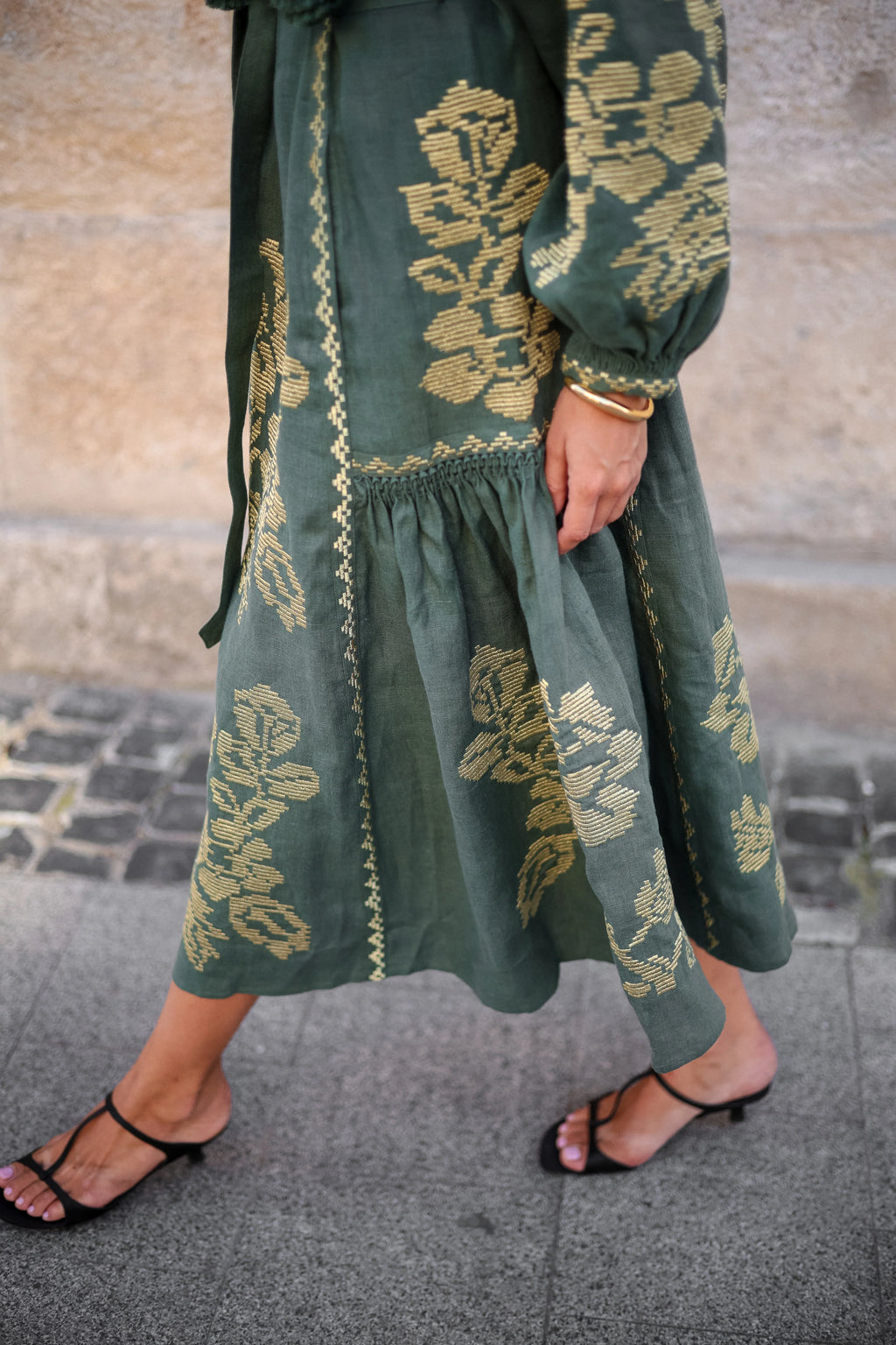 Vyshyvanka bohemian dress - long-sleeve sage green midi dress with gold floral embroidery and black strappy sandals ANNABO