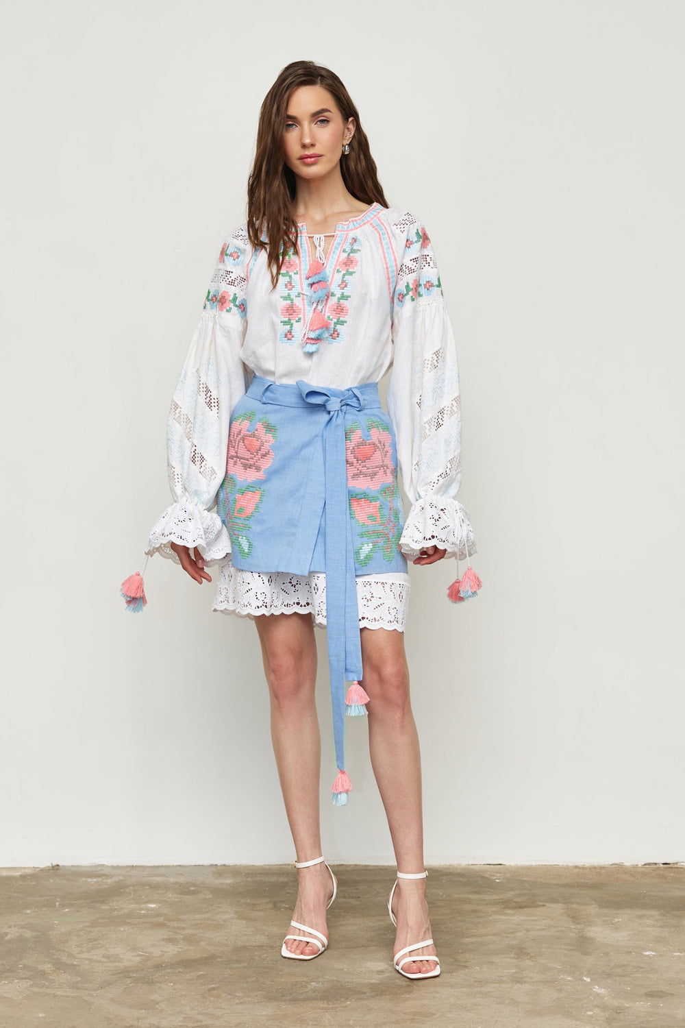 Hand-embroidered folk linen skirt with Richelieu cutwork – fabric detail