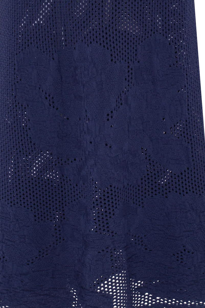 A navy blue knited crochet midi skirt with a scalloped hem, shown against a plain white background.