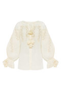 Hand-embroidered linen blouse in ivory