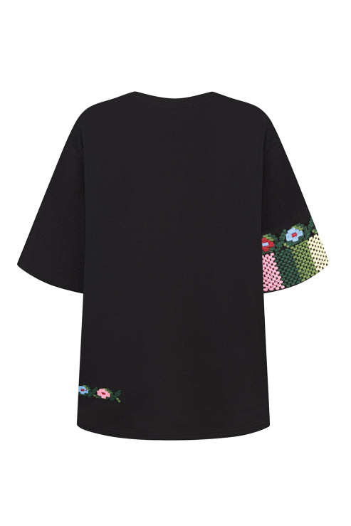 Black t-shirt with colorful sleeve embroidered by artisans