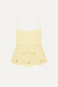 Yellow lace camisole with floral details on a white background