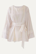 White robe with a belt on a white background