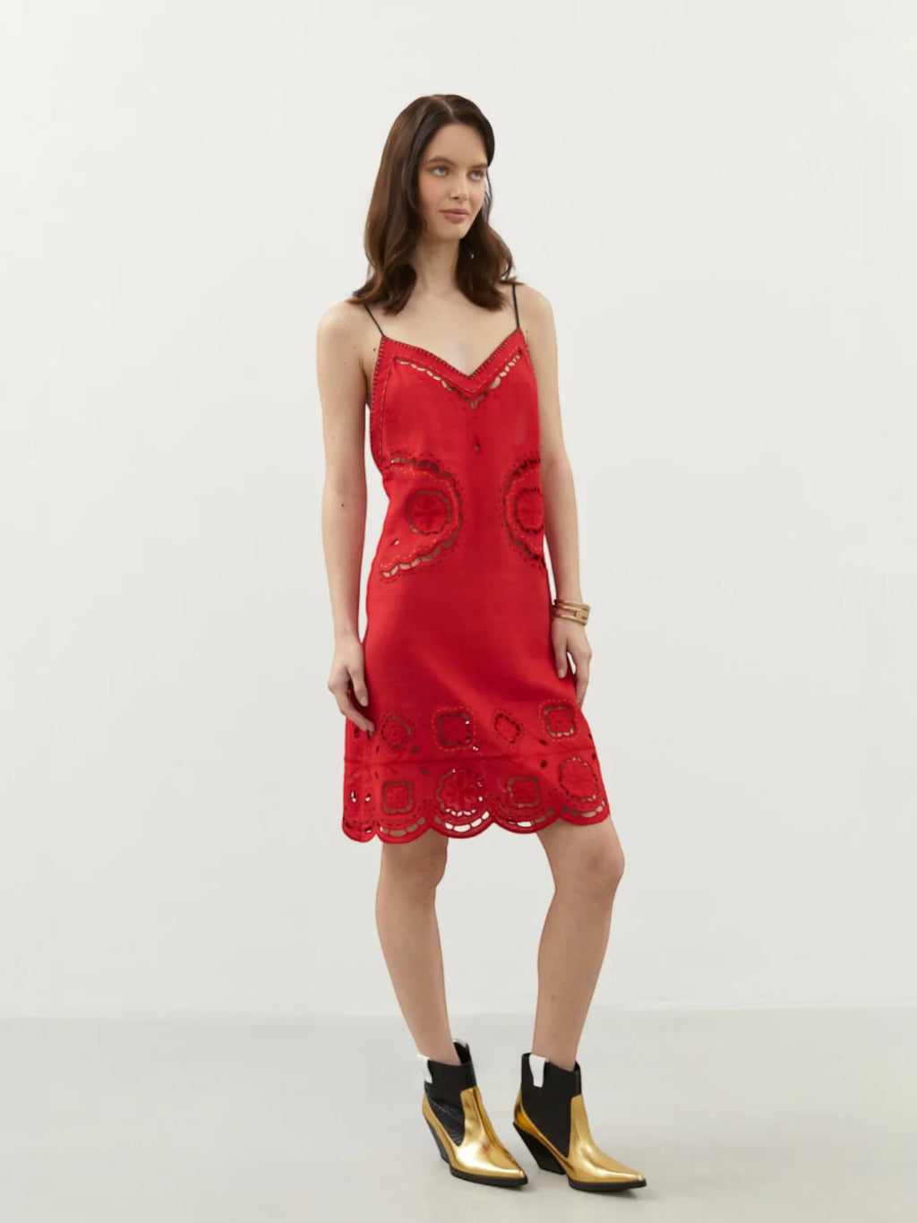 Model wearing the Merezhivo red linen strap dress