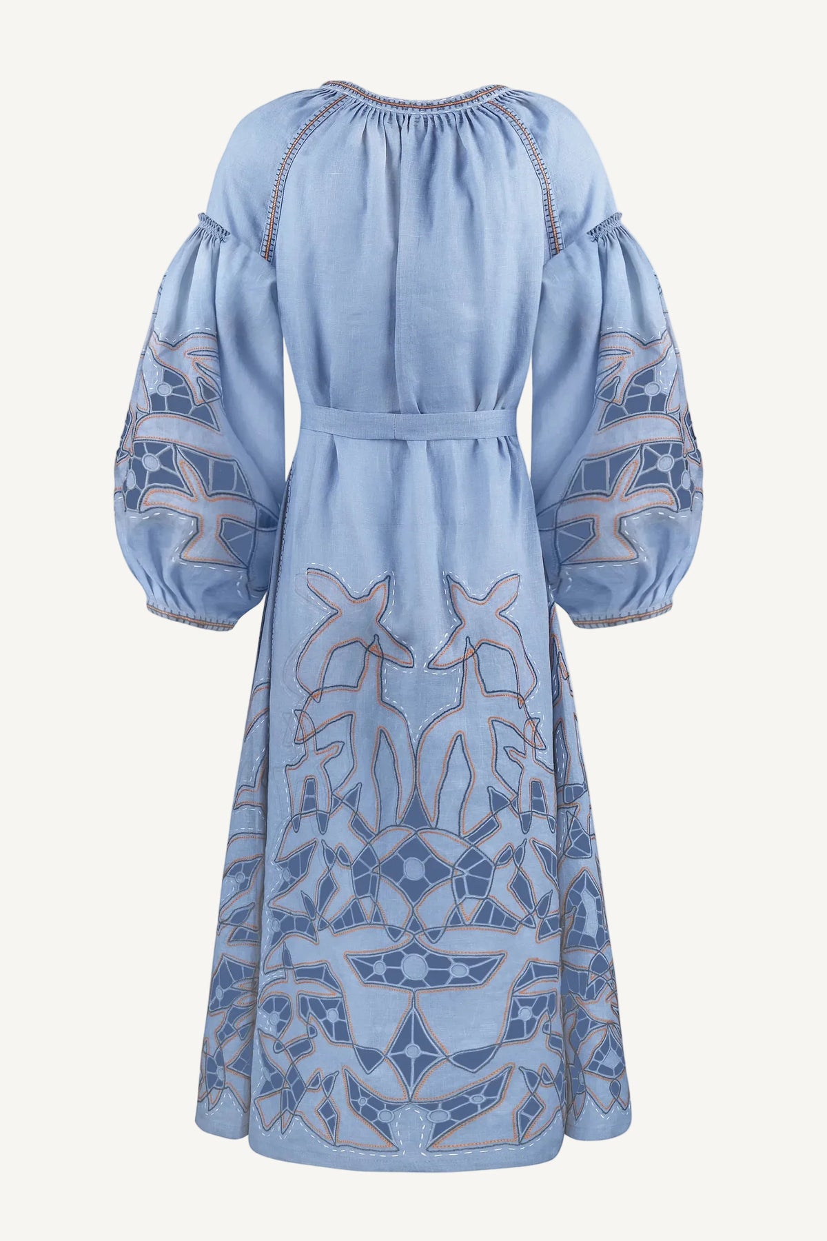 Light blue dress with intricate patterns Women's blue linen midi dress with handmade Richelieu cutwork embroidery, Zbiranka neckline and 24-carat gold beads. Artisan-made by My Sleeping Gypsy. 