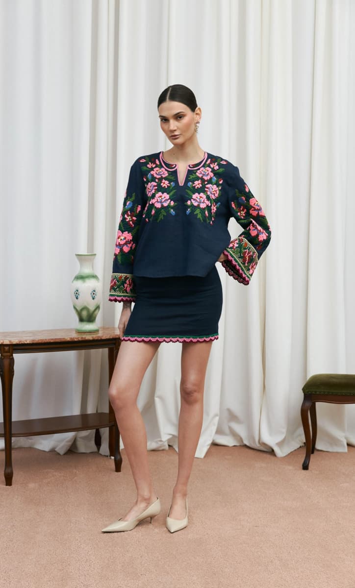 Model wearing the Blossom of Bukovyna embroidered linen blouse