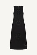 Black dress with circular cut-out patterns 