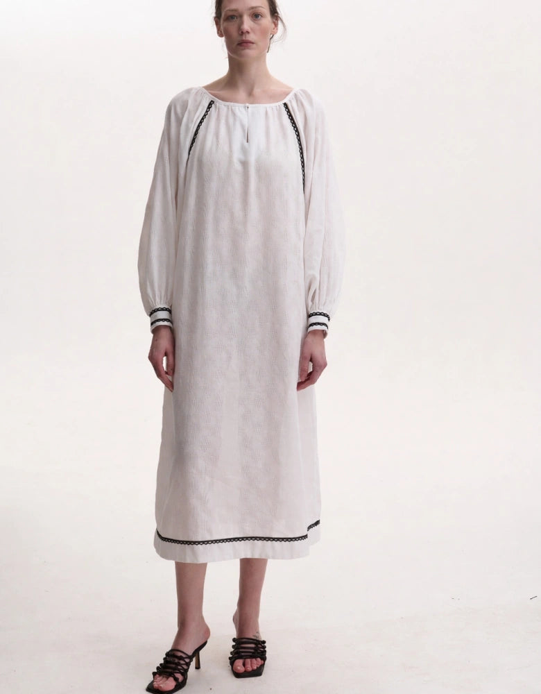 The “Vidrodzhennia” white Ukranian embroiderd dress
