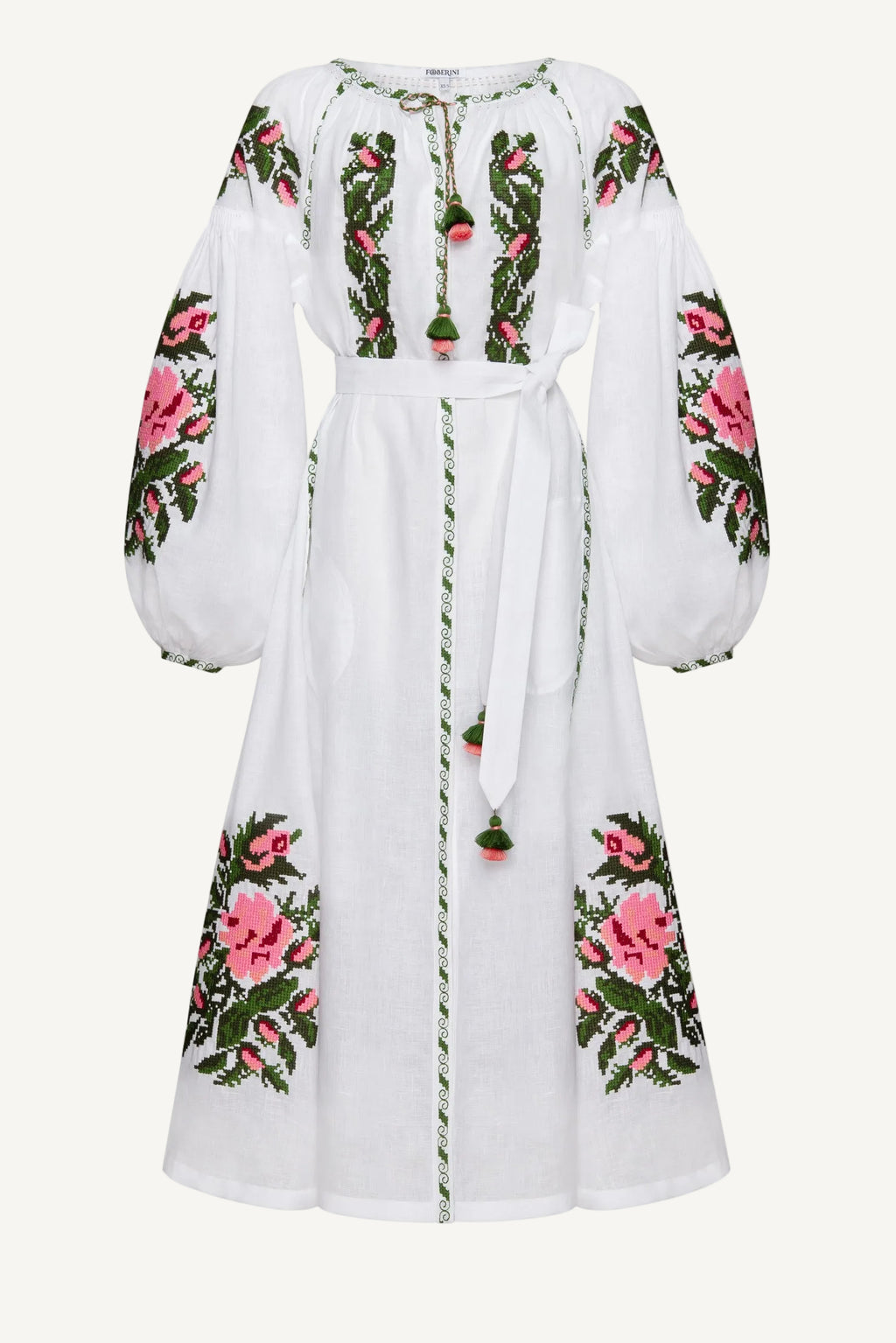White dress with floral embroidery on a white background