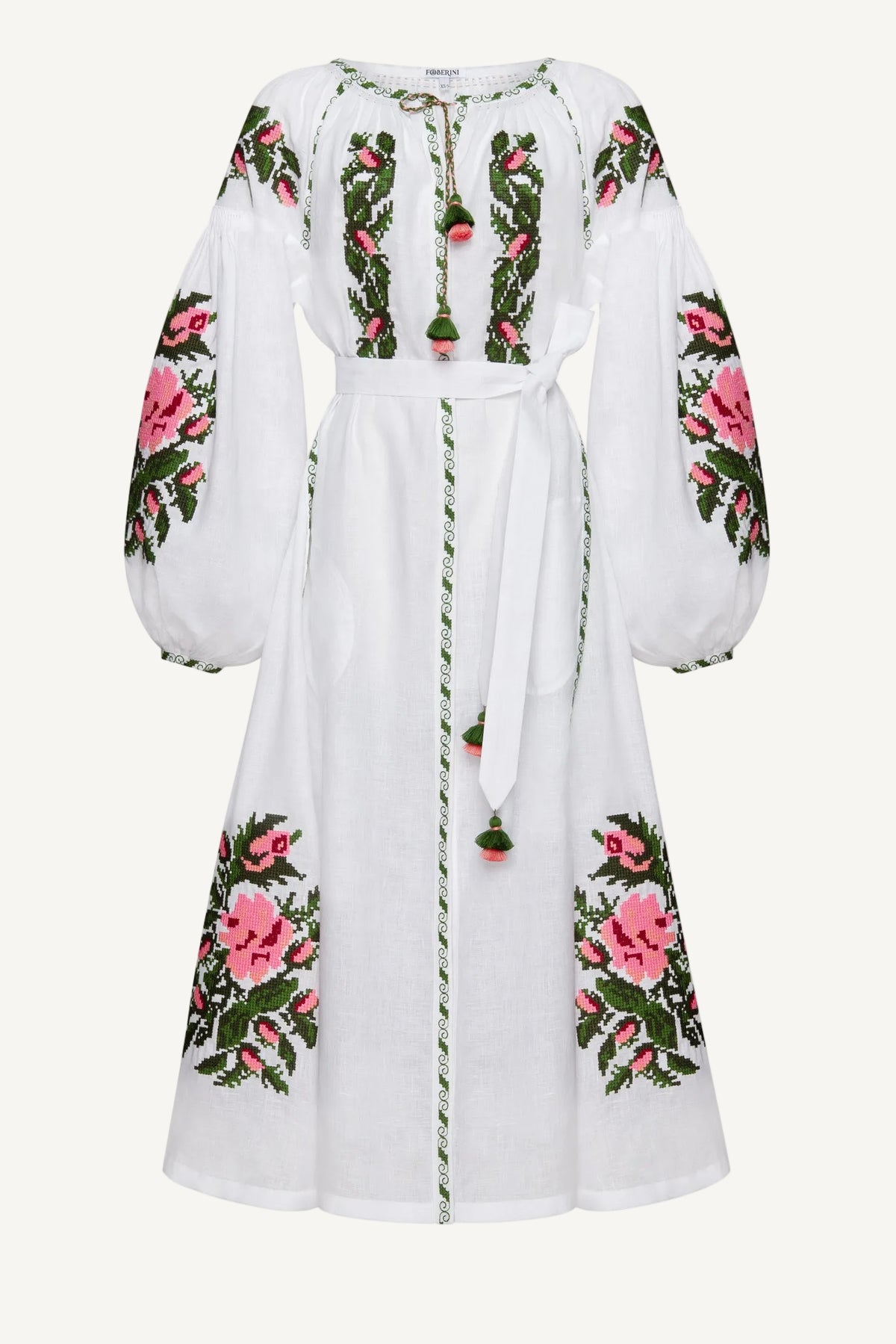 White dress with floral embroidery on a white background