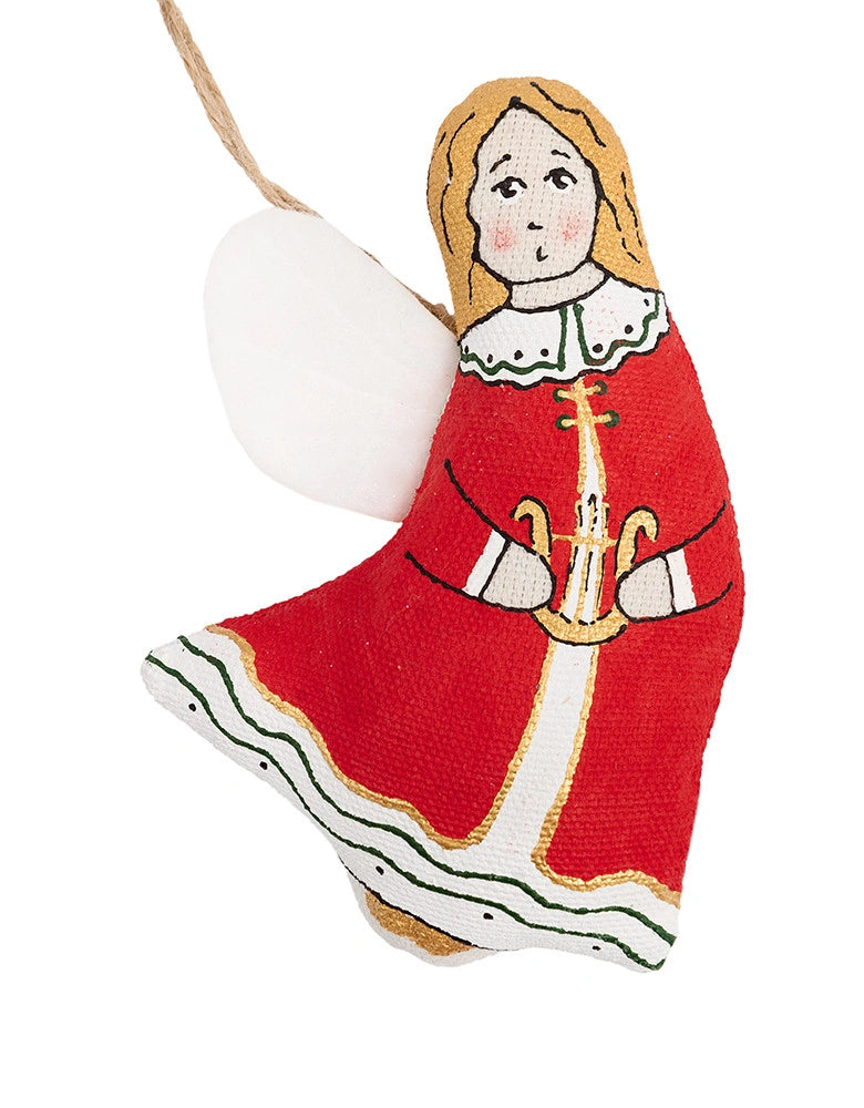Handcrafted wooden Christmas angel ornament painted in red, white, and gold, holding a trumpet and featuring a white wing, shown on a plain white background.