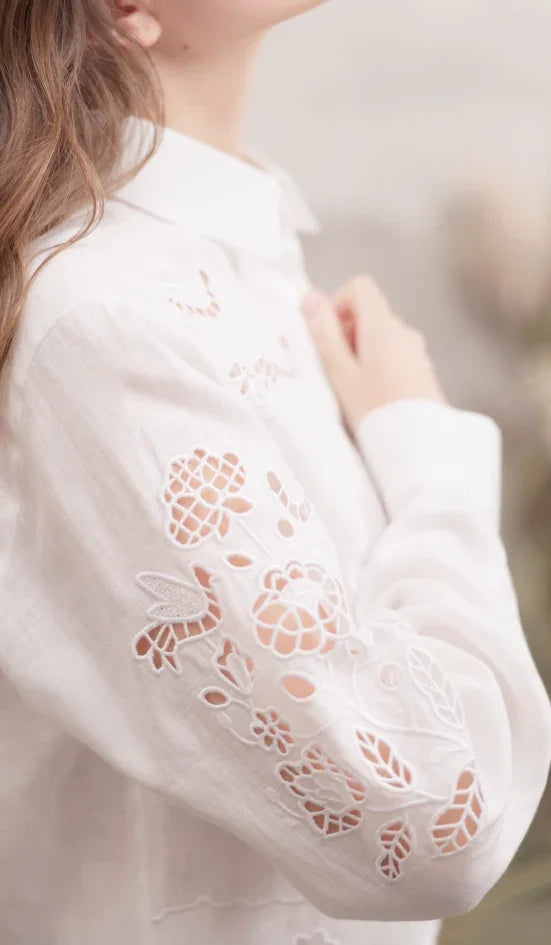Model wearing the Tree of Life cropped white linen blouse