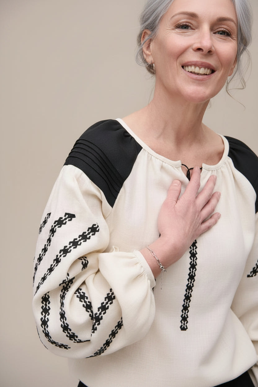 Handcrafted linen blouses with folk embroidery, puff sleeves and geometric 
motifs. Artisan-made in small batches. Slow fashion, locally made.