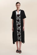 Blouse Roumaine Shop black dress with floral patterns