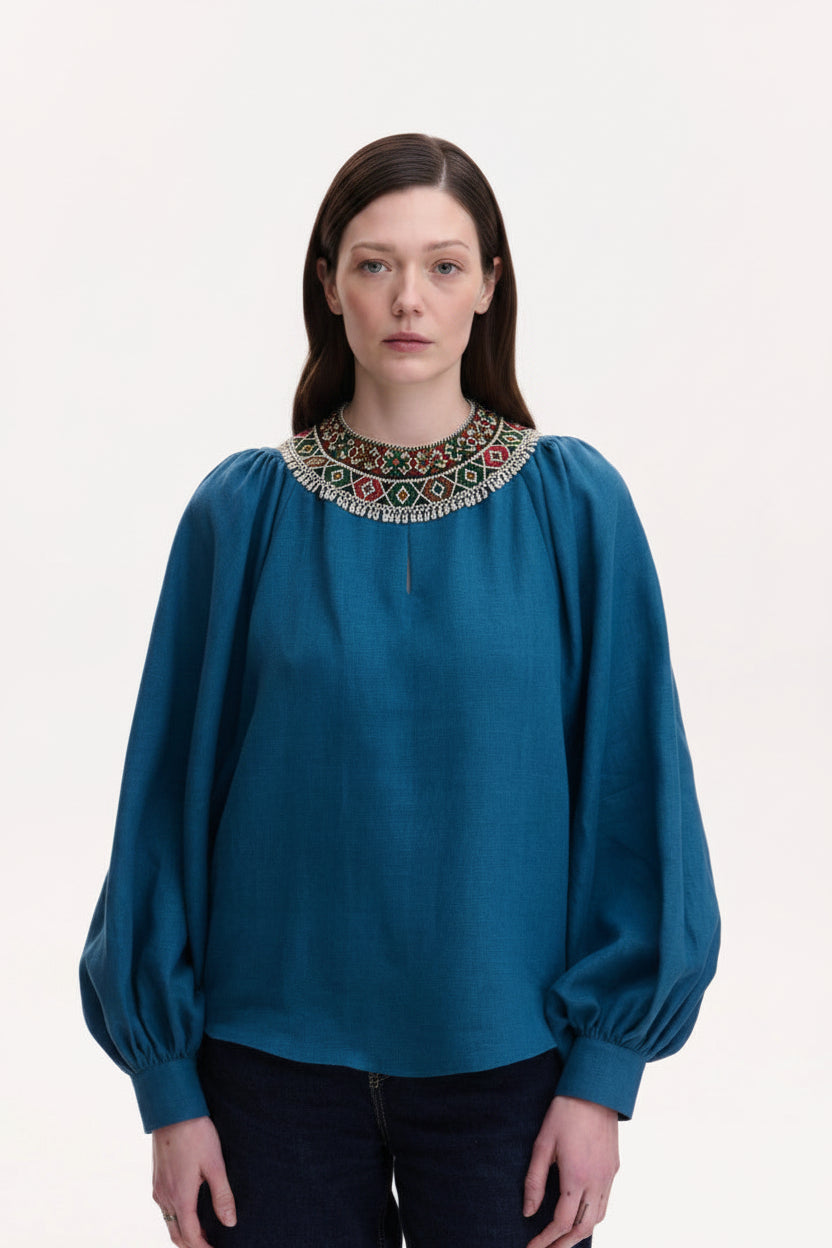 Bohemian linen blouse styled with jeans — Ukrainian heritage