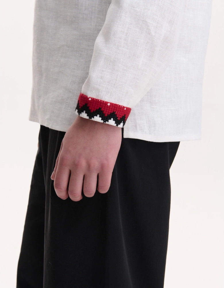 Model wearing Koza Dereza men's hand-embroidered vyshyvanka shirt
