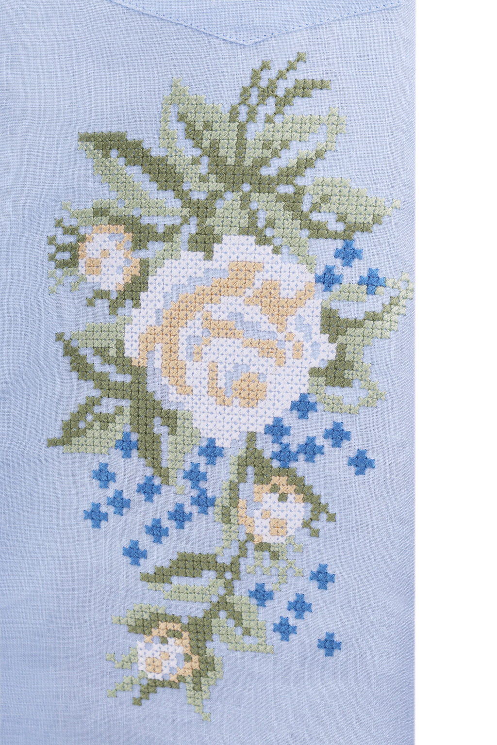 Light blue linen co-ord set with white floral embroidery, styled look