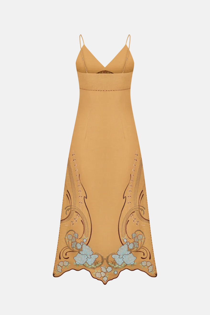 Mustard yellow dress with floral embroidery on a white background