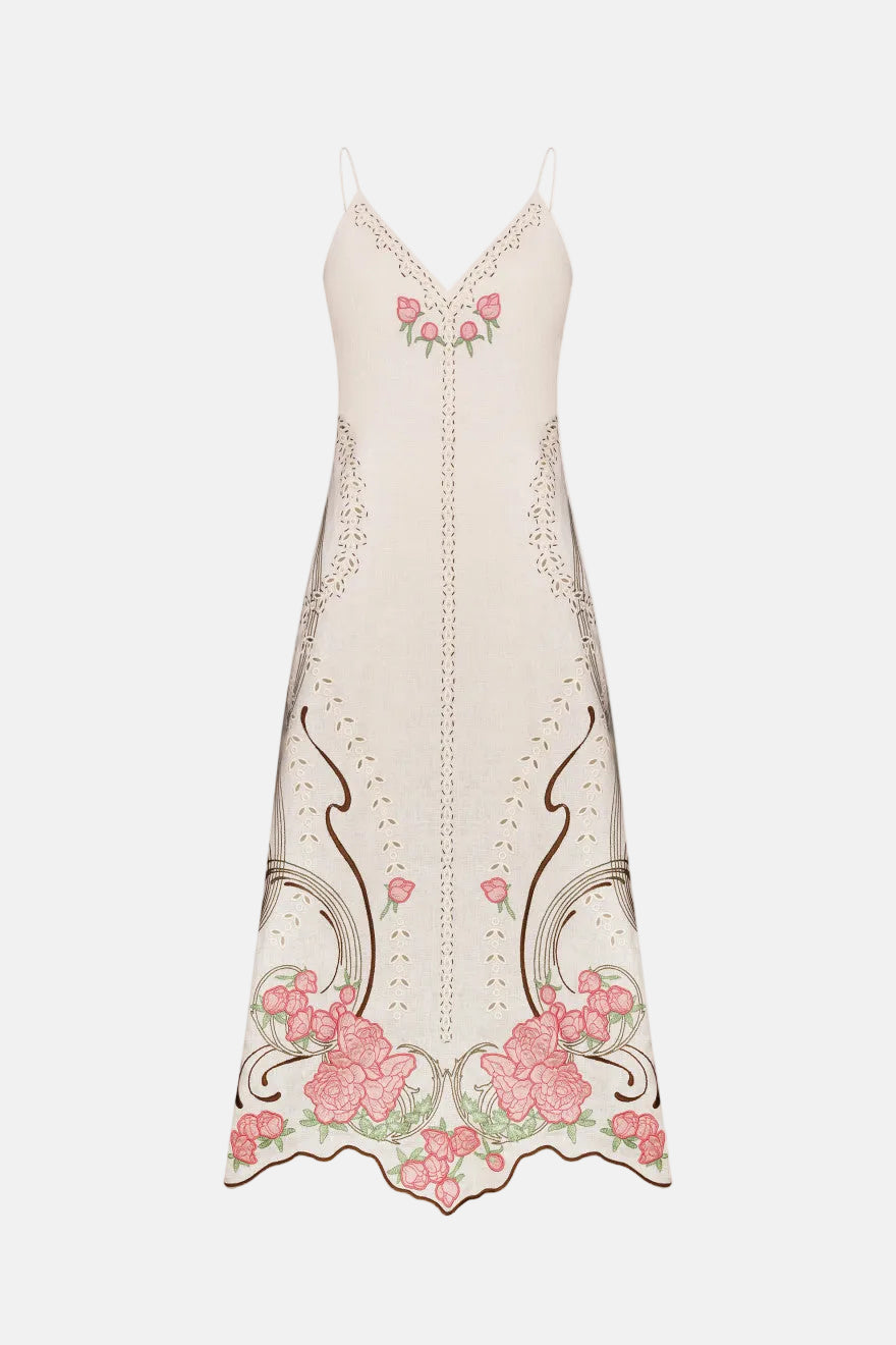 Elegant dress with floral embroidery on a white background