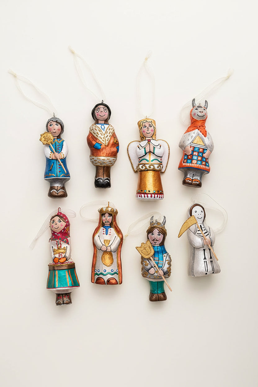 Set of nine hand-painted wooden Christmas ornaments shaped like traditional Slavic folk saints, arranged in two rows against a split green and yellow background with pine branches at the top.