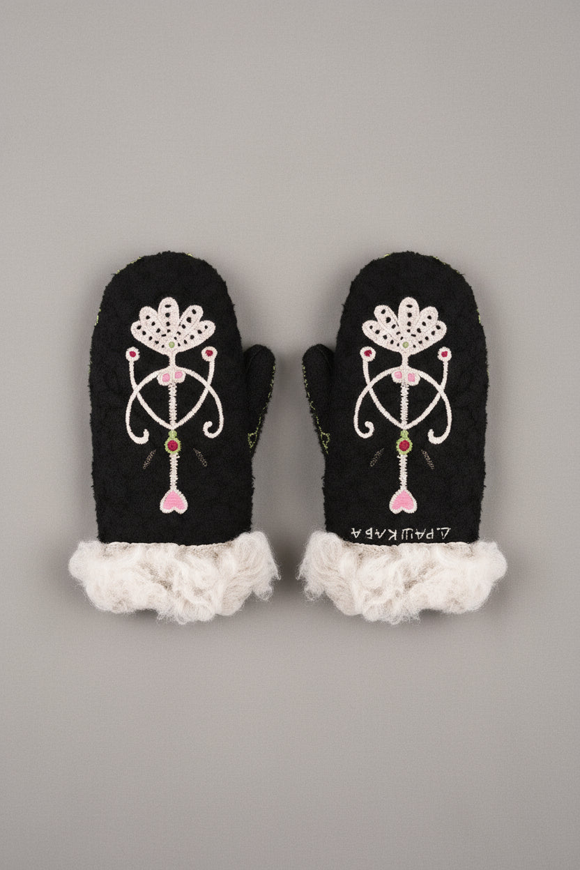 Black mittens with floral design and white lace trim on a white background